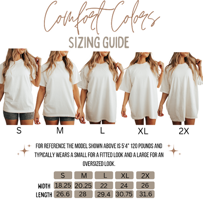Sizing guide graphic for a Comfort Colors t-shirt, showing five models from the waist up wearing sizes S, M, L, XL, and 2X. Below the models is a size chart table listing measurements for each size.